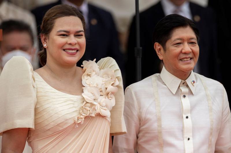 Sara Duterte, the Philippines' new Vice President and daughter of former president Rodrigo Duterte, with Mr Marcos Jr in Manila. Reuters