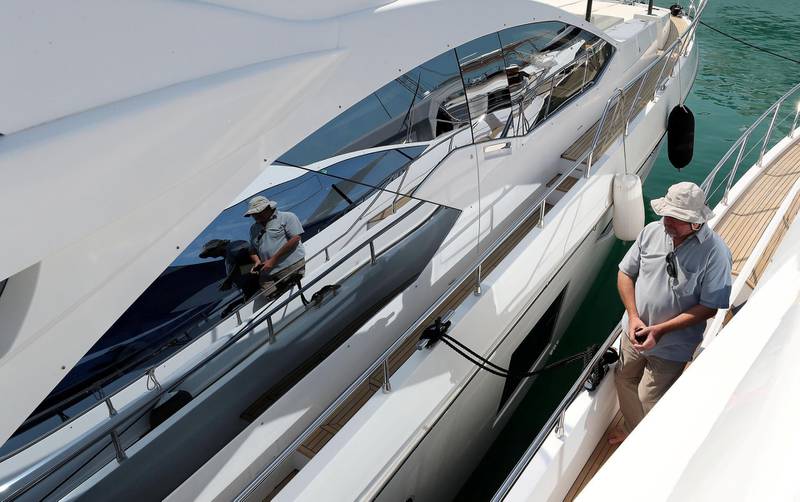 DUBAI , UNITED ARAB EMIRATES , February 26 – 2019 :- Visitors looking different types of boats and yachts at the Dubai International Boat Show held in Dubai. ( Pawan Singh / The National ) For News/Instagram/Big Picture. Story by Nick Webster 
