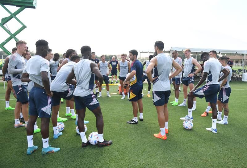Arsenal manager Mikel Arteta talks to his players during the training session in Orlando.