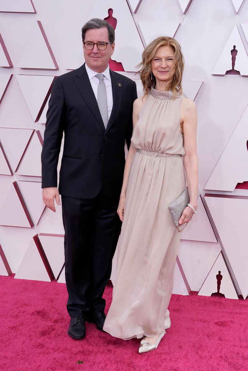 David Rubin, president of the Academy of Motion Picture Arts and Sciences, left, and Dawn Hudson, chief executive officer of the Academy of Motion Picture Arts and Sciences, arrive at the 93rd Academy Awards at Union Station in Los Angeles, California, on April 25, 2021. AP
