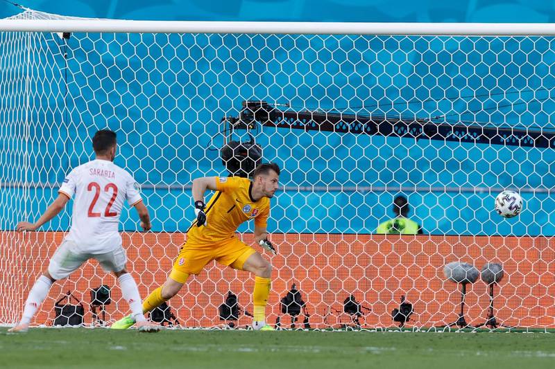 Spain's midfielder Pablo Sarabia scores his team's third goal. AFP