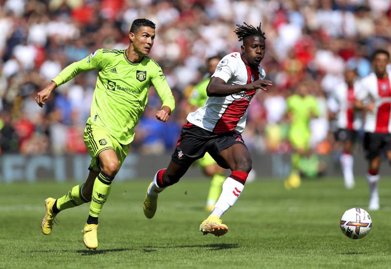 Manchester United's Cristiano Ronaldo, left and Southampton's Mohammed Salisu battle for the ball. AP