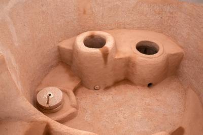 Tandoor ovens and millstones were found indicating cereal processing and bread baking dating back to the 1st century CE.  Victor Besa for The National