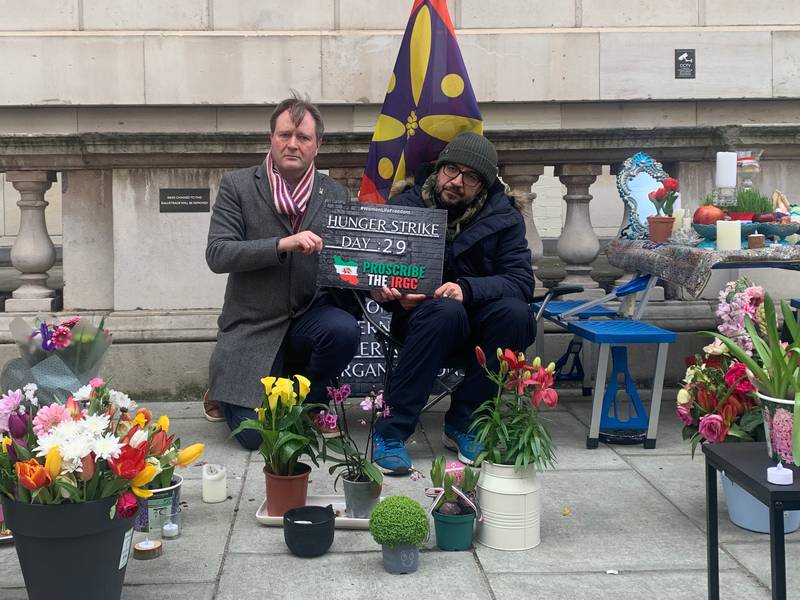 Richard Ratcliffe, whose wife Nazanin was held for years in an Iranian jail on trumped-up charges, visits Mr Beheshti outside the Foreign Office in London. Laura O'Callaghan / The National