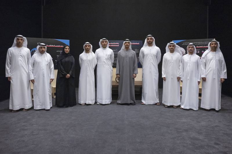 Sheikh Mohamed with the members of the Emirates Lunar Mission team.