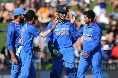 Kuldeep Yadav, right, took four wickets and Yuzvendra Chahal, front left, took two in India's win over New Zealand. AFP