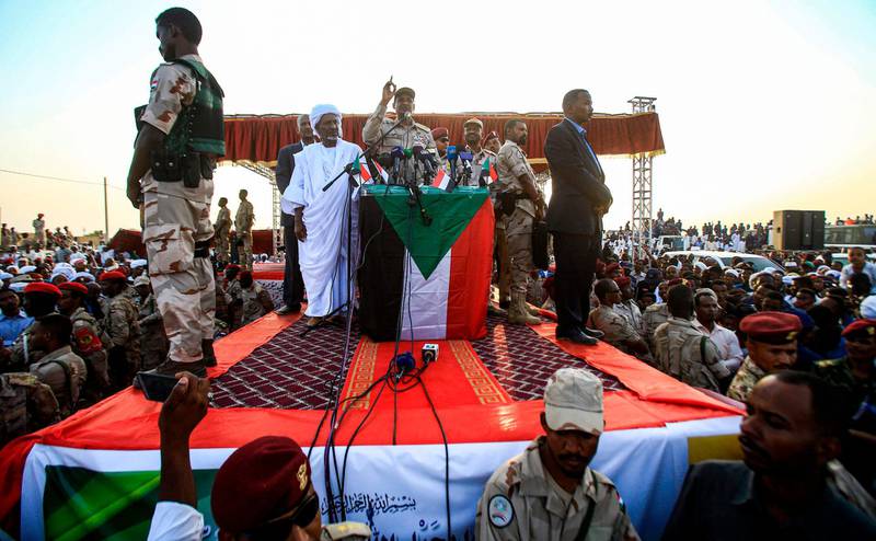 Mohamed Hamdan Dagalo (C), also known as Himediti, deputy head of Sudan's ruling Transitional Military Council (TMC) and commander of the Rapid Support Forces (RSF) paramilitaries, gives a speech in the village of Qarri, about 90 kilometres north of Khartoum. AFP