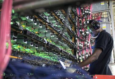 Cryptocurrency mining rigs at a Bitfarms facility in Saint-Hyacinthe, Quebec, Canada. An outage at an exchange foiled bitcoin's recent surge. Bloomberg