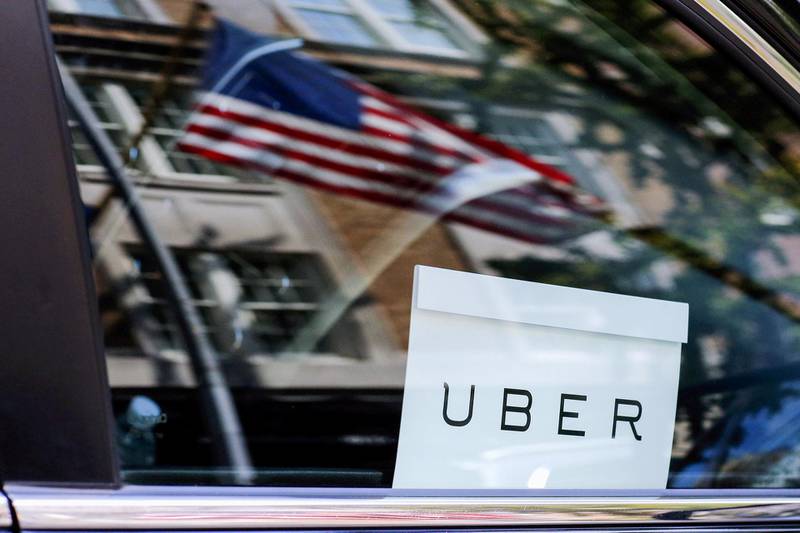 FILE PHOTO: An Uber sign is seen in a car in New York, NY, U.S., June 30, 2015.    REUTERS/Eduardo Munoz/File Photo