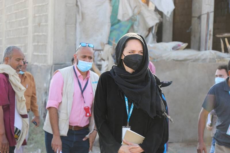 Jolie visits with displaced people in Yemen. Reuters