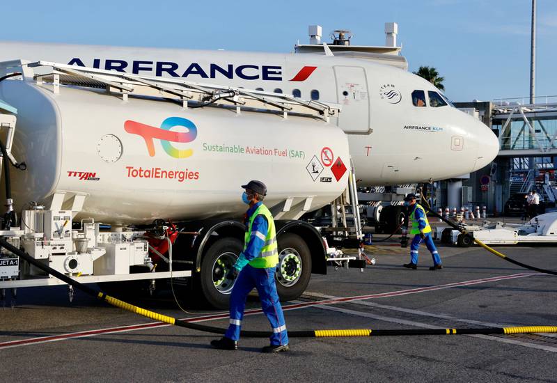 An Air France aircraft, operated with SAF produced by TotalEnergies, being refuelled before a flight from Nice to Paris. Reuters