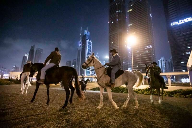 A group of cowboys took over Sheikh Zayed Road in the early hours of Sunday morning. Photo: Ruel Pableo for The National
