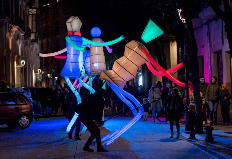 The group 'Light dancers' toured the streets of Palma de Mallorca in Spain to inaugurate the Christmas lighting, on November 28. EPA
