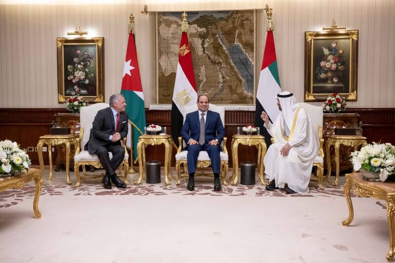 Sheikh Mohamed bin Zayed, Crown Prince of Abu Dhabi and Deputy Supreme Commander of the UAE Armed Forces, with Abdel Fattah El Sisi, President of Egypt, centre, and King Abdullah II of Jordan, at Cairo International Airport. Hamad Al Kaabi / Ministry of Presidential Affairs