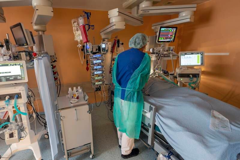 Head doctor Dr Lorenz Nowak treats a Covid-19 patient in the intensive care unit of Asklepios Clinic in Munich, Germany. AP