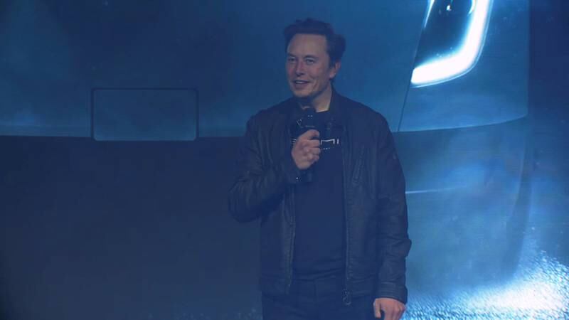 Mr Musk speaks during the live-streamed unveiling. Reuters