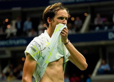 Daniil Medvedev of Russia wipes his face while playing Rafael Nadal of Spain during the men's US Open final. AFP