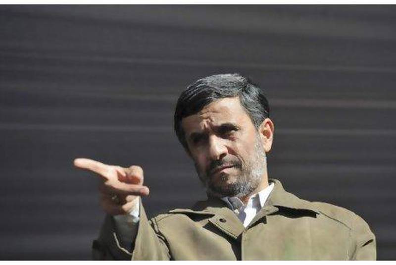 Iranian President Mahmoud Ahmadinejad gestures prior to delivering his speech at a public gathering during his provincial tour in the city of Qazvin about 140km west of Tehran.