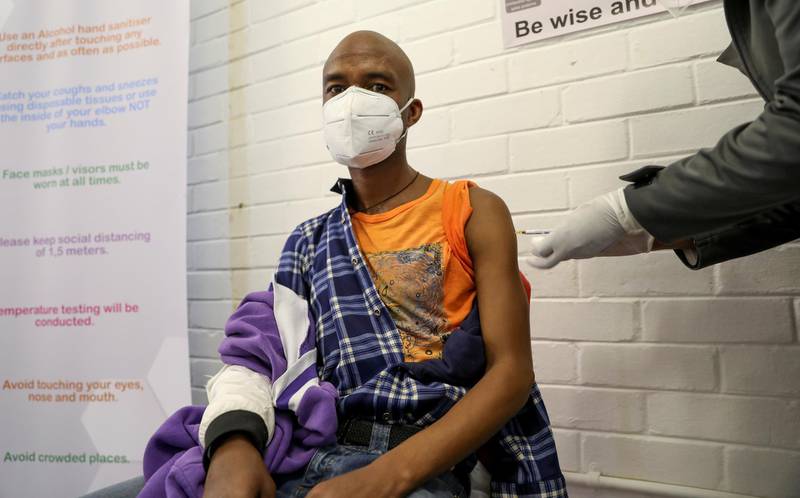 A volunteer receives an injection from a medical worker during the country's first human clinical trial for a potential vaccine against the novel coronavirus, at the Baragwanath hospital in Soweto, South Africa, June 24, 2020. REUTERS