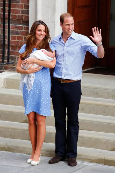 epa04390756 (FILE) A file picture dated 23 July 2013 shows Britain's Prince William, Duke of Cambridge (R) and his wife, Catherine, the Duchess of Cambridge, departing the Lindo Wing of St. Mary's hospital with their child, Prince George, in London, Britain.  Clarence House has confirmed on 08 September 2014 that Catherine, Duchess of Cambridge, is pregnant with her second child.  EPA/TAL COHEN