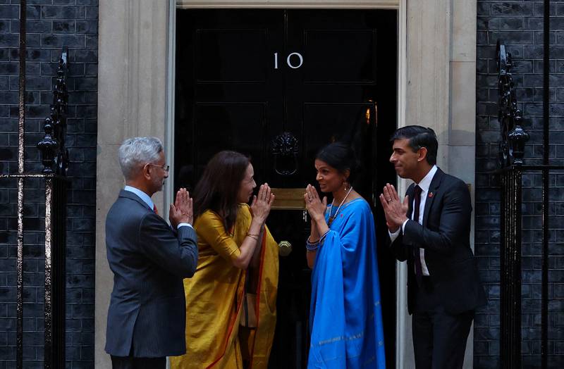 From left, Indian External Affairs Minister Subrahmanyam Jaishankar, his wife Kyoko, Akshata Murty and her husband, UK Prime Minister Rishi Sunak, outside No 10 Downing Street, London. Reuters