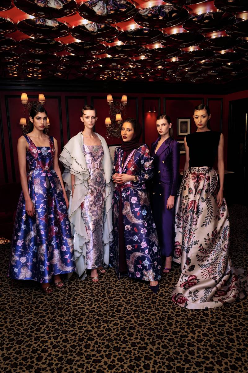 Arwa Alammari, centre, with models in her designs. Photo: AlUla Creates / British Fashion Council
