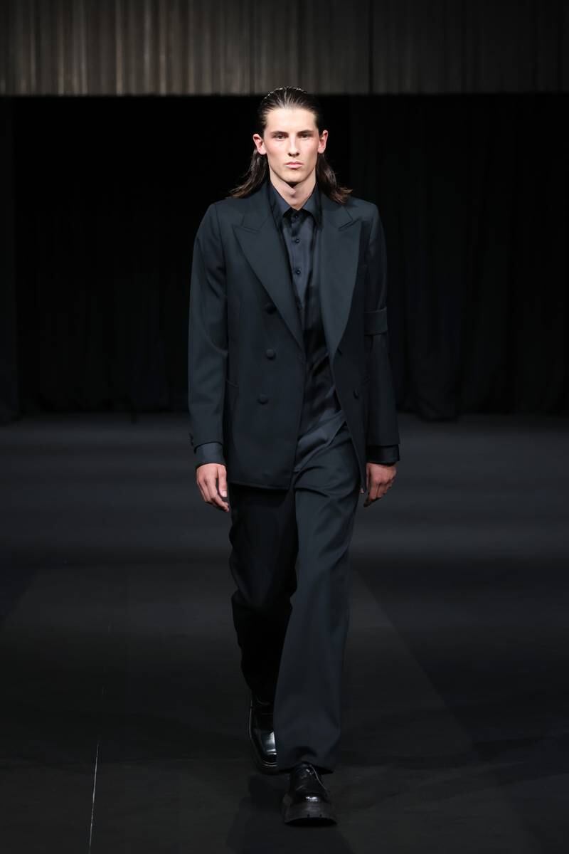 Daniel W Fletcher's show led a minute's silence, when it opened the pre-event evening on Thursday. It was followed with a first look at a mourning suit, with black armband. Getty