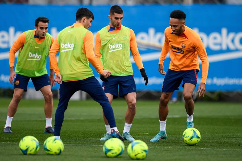 Pedri,  Ferran Torres and Pierre-Emerick Aubameyang take part in a training session. AFP