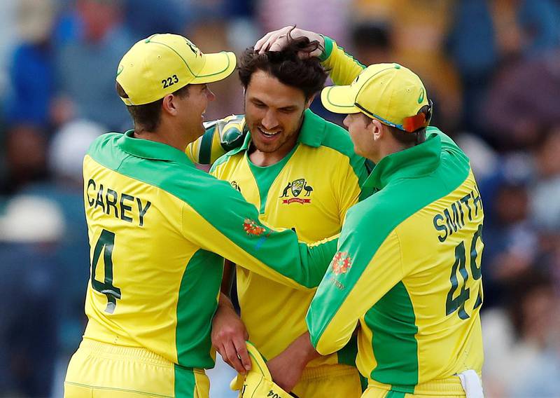 Cricket - ICC Cricket World Cup - Australia v West Indies - Trent Bridge, Nottingham, Britain - June 6, 2019   Australia's Nathan Coulter-Nile celebrates with Steve Smith and Alex Carey at the end of the match    Action Images via Reuters/Andrew Boyers