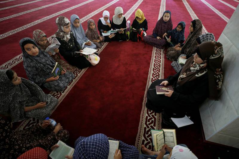Girls attend a Koran class as Palestinians ease the Covid-19 restrictions, in a mosque in Gaza City. Reuters