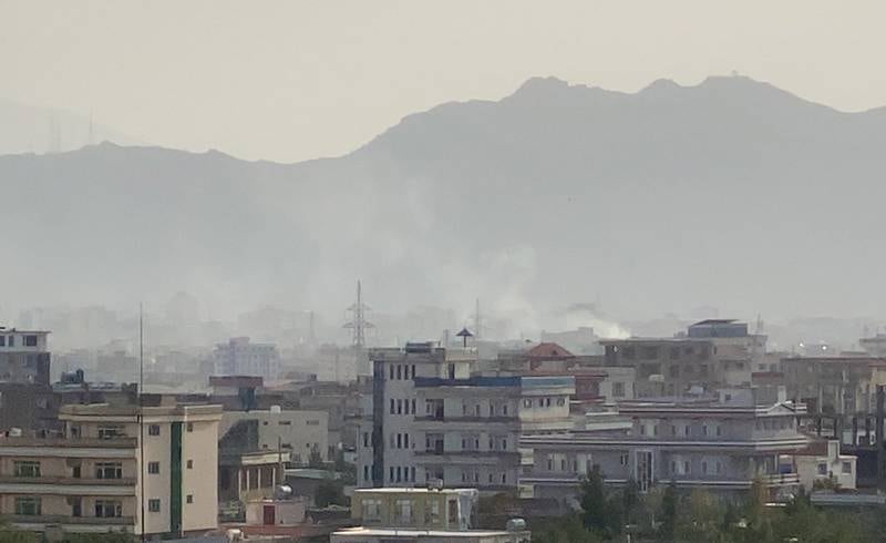 Smoke billows after an explosion near the Hamid Karzai International Airport, in Kabul on August 29, 2021. EPA