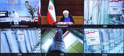 TOPSHOT - A handout picture provided by the Iranian presidential office on April 10, 2021, shows a screen grab from a videoconference showing views of centrifuges and devices at Iran's Natanz uranium enrichment plant, as well as Iranian President Hassan Rouhani delivering a speech, on Iran's National Nuclear Technology Day, in the capital Tehran. Iran announced today it has started up advanced uranium enrichment centrifuges in a breach of its undertakings under a troubled 2015 nuclear deal, days after talks on rescuing it got underway.
President Hassan Rouhani officially inaugurated the cascades of 164 IR-6 centrifuges and 30 IR-5 devices at Iran's Natanz uranium enrichment plant in a ceremony broadcast by state television.
 - === RESTRICTED TO EDITORIAL USE - MANDATORY CREDIT "AFP PHOTO / HO / IRANIAN PRESIDENCY" - NO MARKETING NO ADVERTISING CAMPAIGNS - DISTRIBUTED AS A SERVICE TO CLIENTS ===
 / AFP / Iranian Presidency / - / === RESTRICTED TO EDITORIAL USE - MANDATORY CREDIT "AFP PHOTO / HO / IRANIAN PRESIDENCY" - NO MARKETING NO ADVERTISING CAMPAIGNS - DISTRIBUTED AS A SERVICE TO CLIENTS ===

