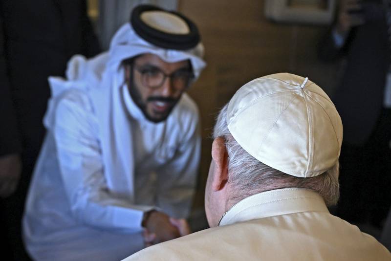 The pontiff personally greeted each of the 60 or so media personnel while on the flight from Rome to Manama, Bahrain. AP