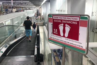 Dubai, United Arab Emirates - Reporter: N/A: A sign says 'Thank you for practicing social distancing' at a supermarket in Dubai Investment Park (DIP). Monday, March 30th, 2020. Dubai. Chris Whiteoak / The National