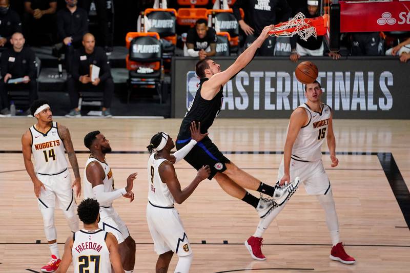 Los Angeles Clippers center Ivica Zubac scores against the Denver Nuggets during the NBA Western Conference semi-final playoff at the ESPN Wide World of Sports Complex in Kissimmee, Florida, onTuesday, September 15. Denver won the series 4-3. AP