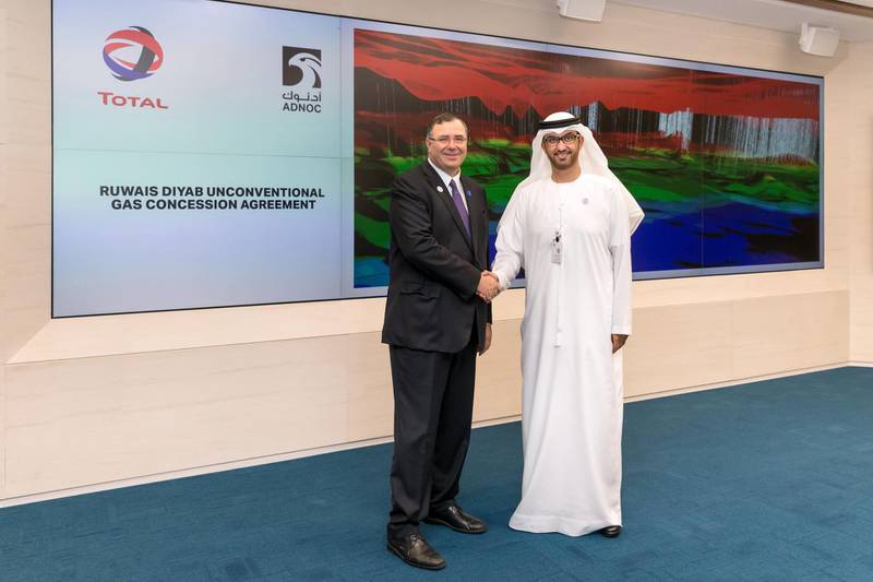 Patrick Pouyanne, chief executive of Total, with Adnoc group chief executive Dr Sultan Al Jaber after Adnoc awarded a 40 per cent stake in the Ruwais Diyab gas concession to the French energy company. Adnoc