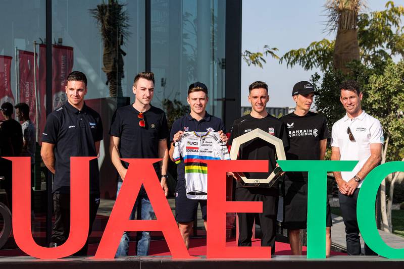 Left to right: Dylan Groenewegen, Elia Viviani, Remco Evenepoel, Adam Yates, Peio Bilbao, and Mark Cavendish on the eve of UAE tour in Abu Dhabi on February 19, 2023. AFP