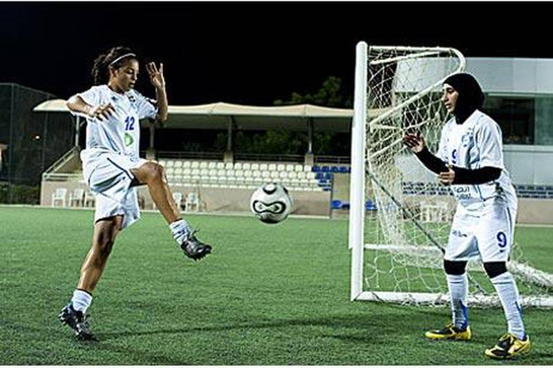 Abu Dhabi Women's Football Club players Elaa Ahmed Hassan, right, and Danya Waqfi.