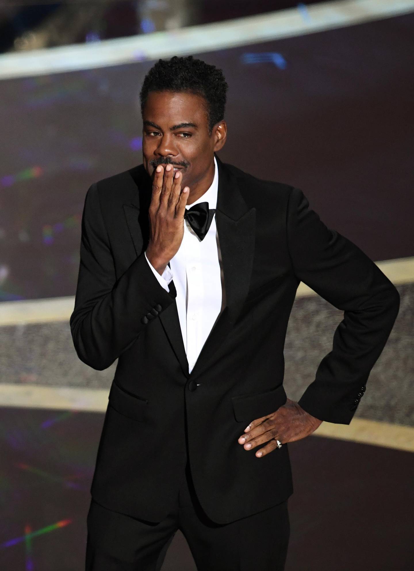 HOLLYWOOD, CALIFORNIA - FEBRUARY 09: Chris Rock speaks onstage during the 92nd Annual Academy Awards at Dolby Theatre on February 09, 2020 in Hollywood, California.   Kevin Winter/Getty Images/AFP