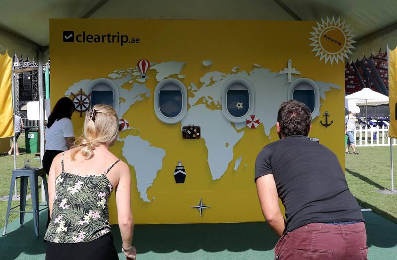 ABU DHABI , UNITED ARAB EMIRATES ,  November 9 , 2018 :- People playing fun game at the cleartrip.ae stall during the Taste of Abu Dhabi held at Du Arena on Yas Island in Abu Dhabi.  ( Pawan Singh / The National )  For News/Online/Instagram