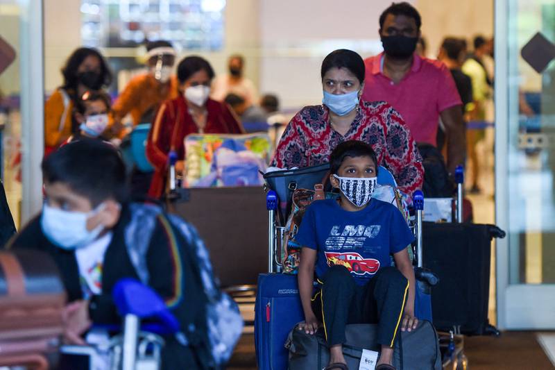 Children under 5 are exempt from testing and vaccination requirements when flying to India. AFP