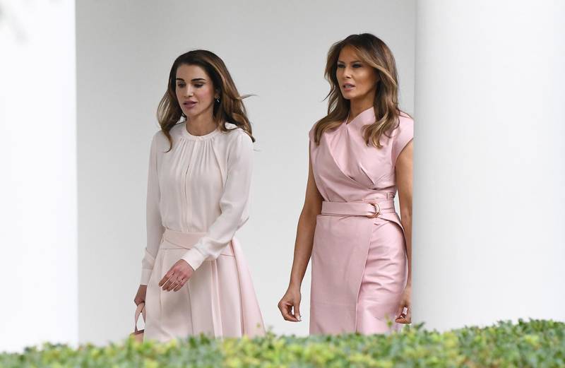 First lady Melania Trump, right, walks with Queen Rania. AFP