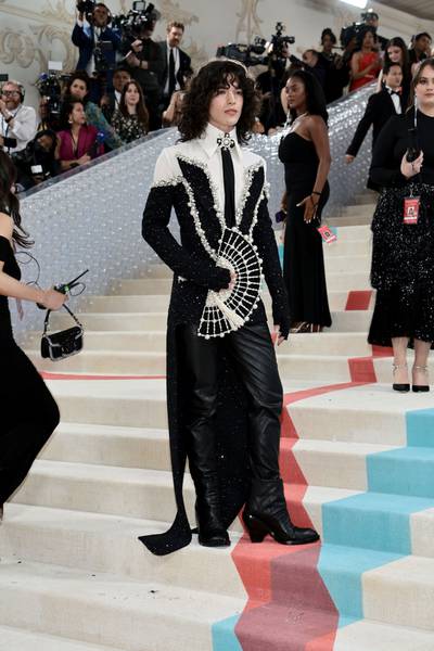 Conan Gray pays homage to Lagerfeld's signature style. AFP