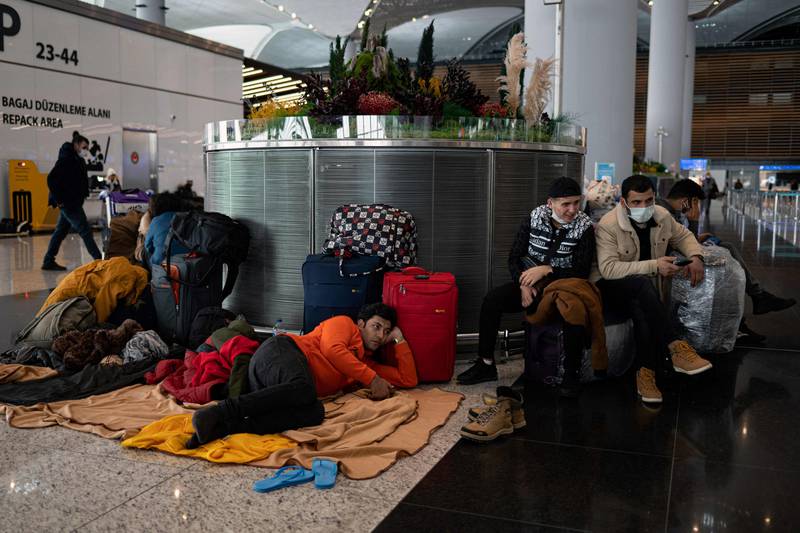 Stranded passengers wait at Istanbul Airport. AFP