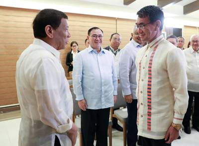 Rodrigo Duterte with Japanese Foreign Minister Taro Kono during a meeting in Davao city, Philippines.  EPA