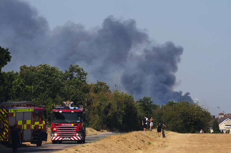 Emergency services tackle a fire on Dartford Heath. Grass fires broke out around the country during an intense heatwave. Getty