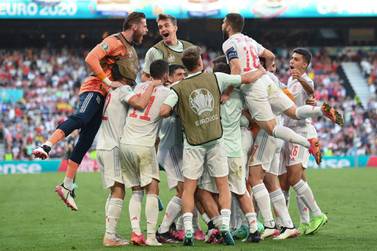 TOPSHOT - Spain's players celebrate their fifth goal during the UEFA EURO 2020 round of 16 football match between Croatia and Spain at the Parken Stadium in Copenhagen on June 28, 2021. / AFP / POOL / STUART FRANKLIN
