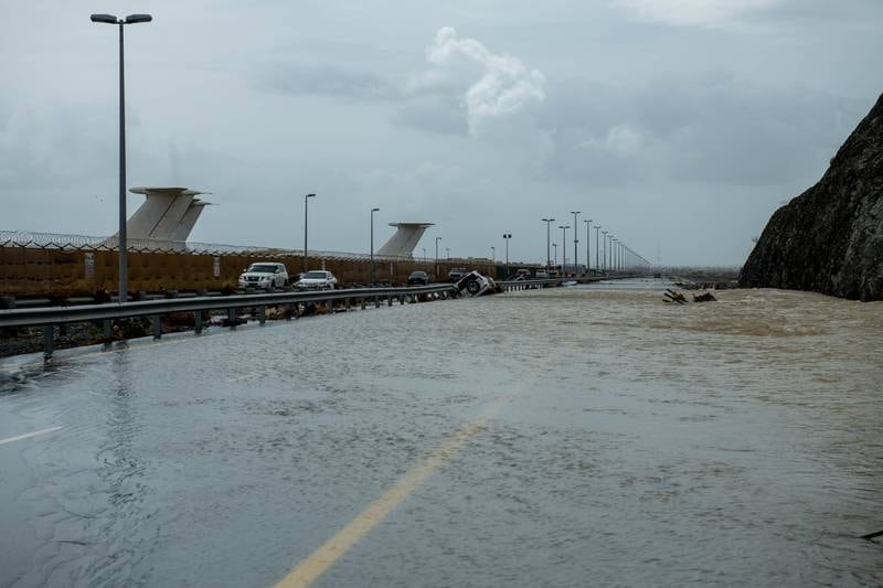 A car swept away in the floods on the outskirts of Fujairah. Issa Alkindy/The National