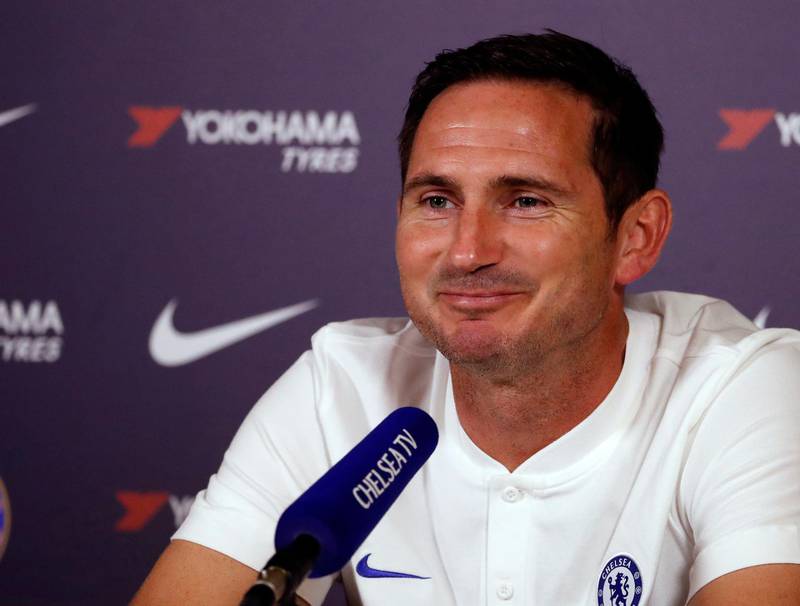 Chelsea's manager Frank Lampard smiles as he listens to a question during a media conference at the teams training ground in Cobham, England, Friday, Aug. 9, 2019. Chelsea play Manchester United in Manchester on Sunday in their opening English Premier League 2019/2020 fixture. (AP Photo/Alastair Grant)