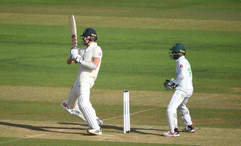SOUTHAMPTON, ENGLAND - AUGUST 17: Zak Crawley of England(L) plays a shot as Mohammad Rizwan of Pakistan(R) looks on during Day Five of the 2nd #RaiseTheBat Test Match between England and Pakistan at the Ageas Bowl on August 17, 2020 in Southampton, England. (Photo by Gareth Copley/Getty Images for ECB)